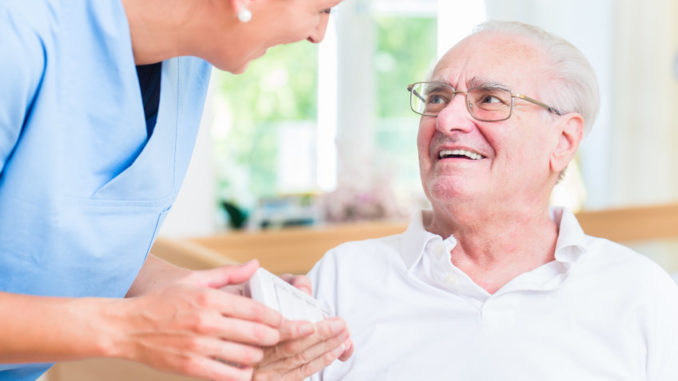 Krankenschwester mit Patient